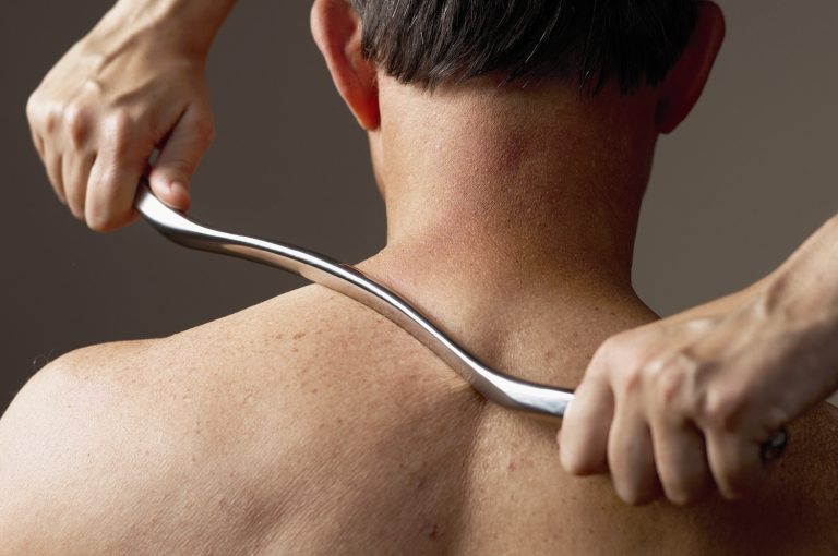 GRASTON technique being provided by Chiropractor to Neck