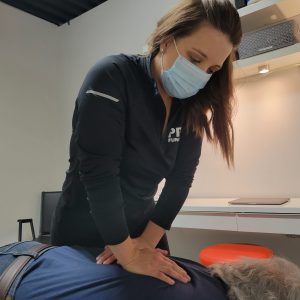 Dr. Nicole Thornicroft adjusting a patient